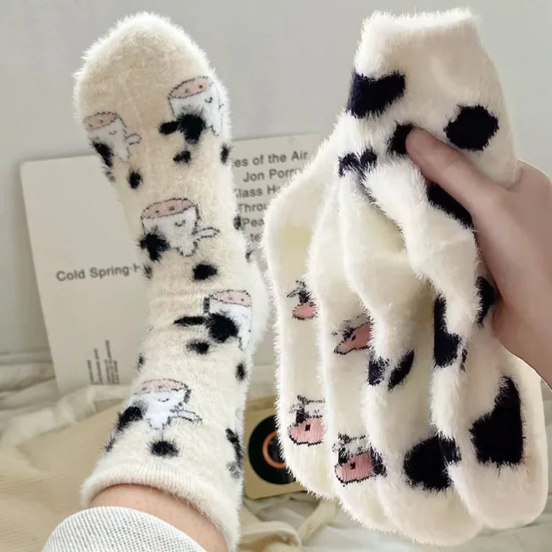 Meis de veludo com desenho de vaca