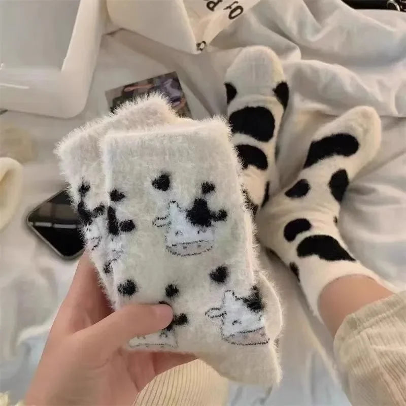 Meis de veludo com desenho de vaca