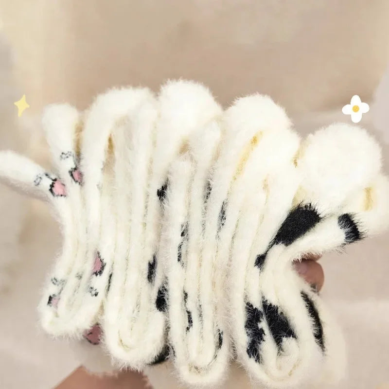 Meis de veludo com desenho de vaca